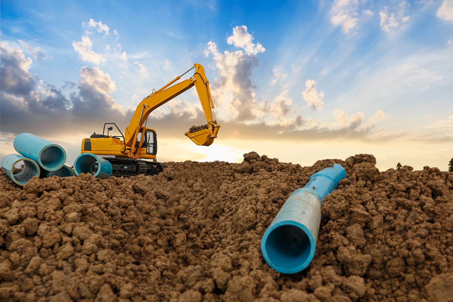Excavator working on a drainage site